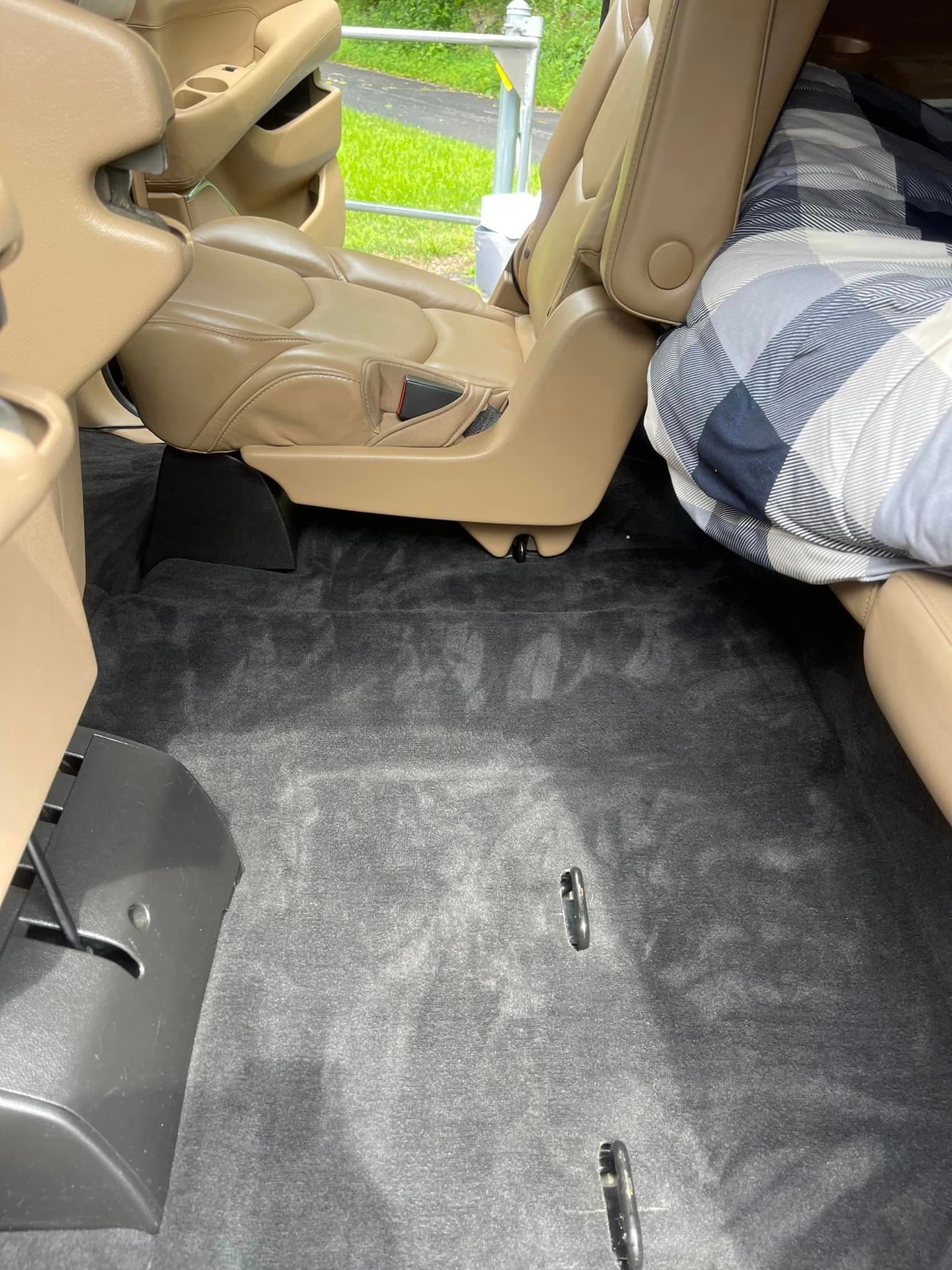 Auto Detailing - Cadillac Escalade Platinum console - Professional Detailing Wisconsin Dells