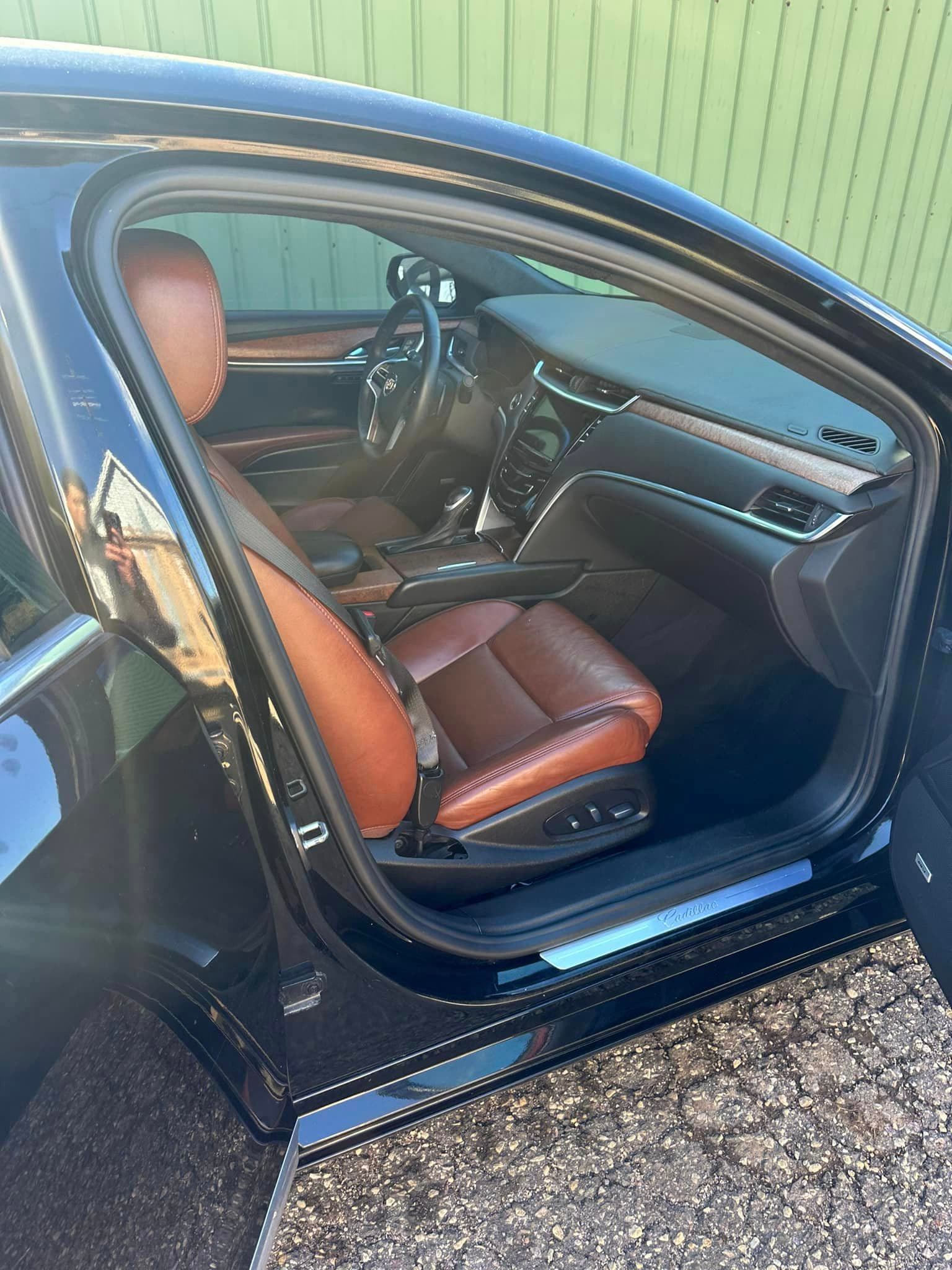 Auto Detailing - Cadillac XTS door panel - Professional Detailing Wisconsin Dells