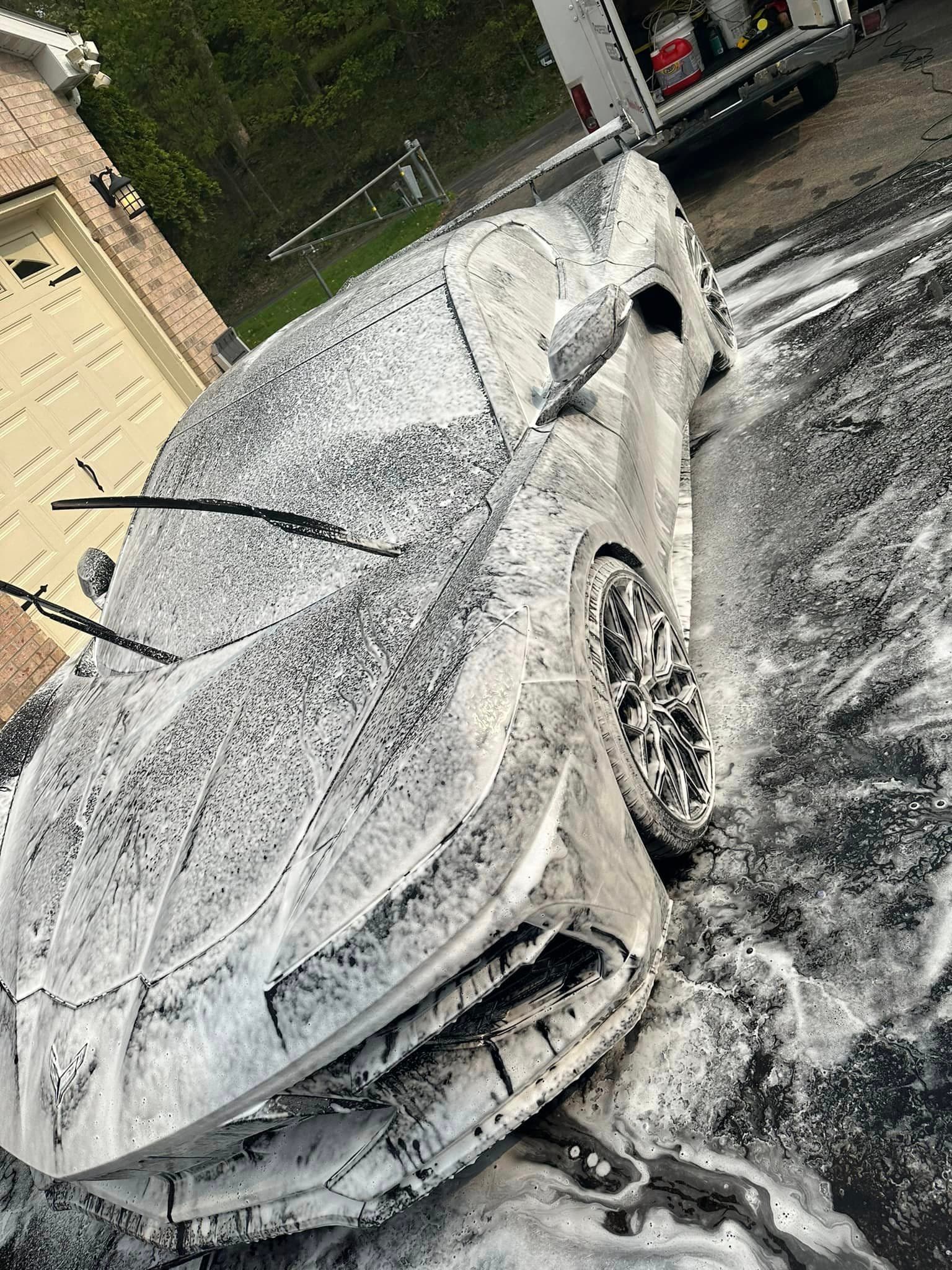 Auto Detailing - Black Chevrolet Corvette C8 mid-foam wash - Professional Detailing Wisconsin Dells